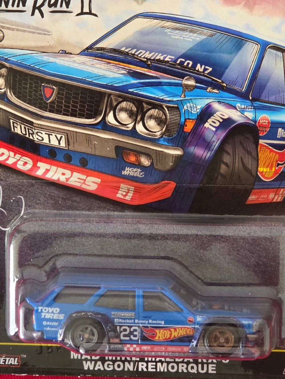 2025 HOT WHEELS, PREMIUM REAL RIDERS, MAD MIKE MAZDA RX-3 WAGON, MINT IN THE PAC